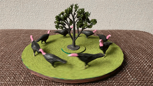 木の周りをぐるぐるする七面鳥（再現模型）.gif